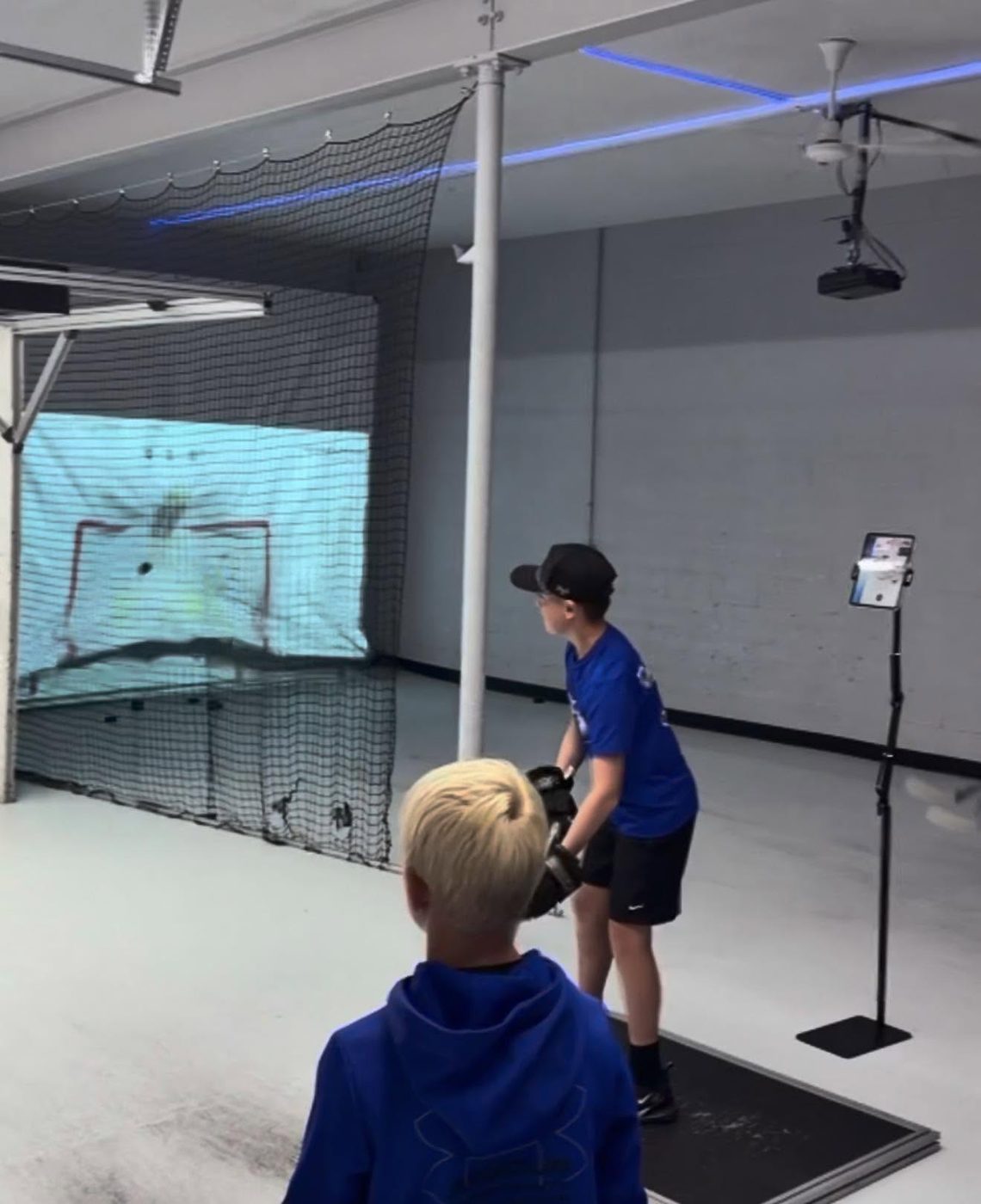 Player at the shooting simulator