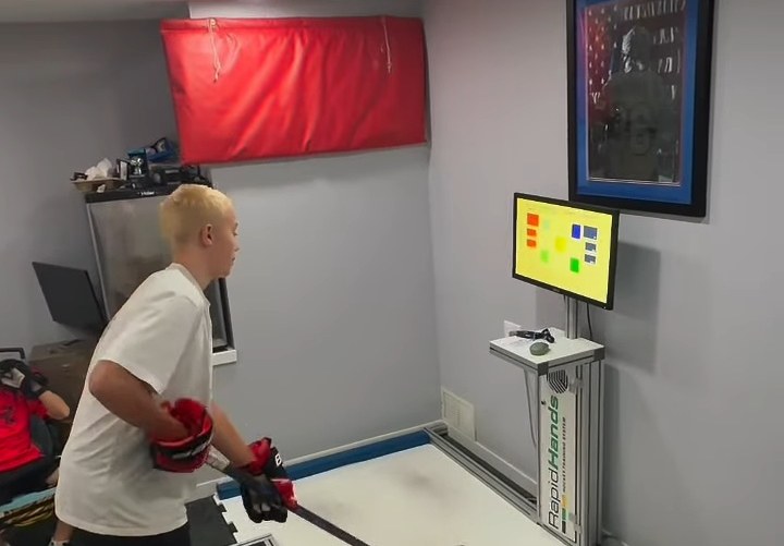 Player on the Rapid Hands reaction trainer